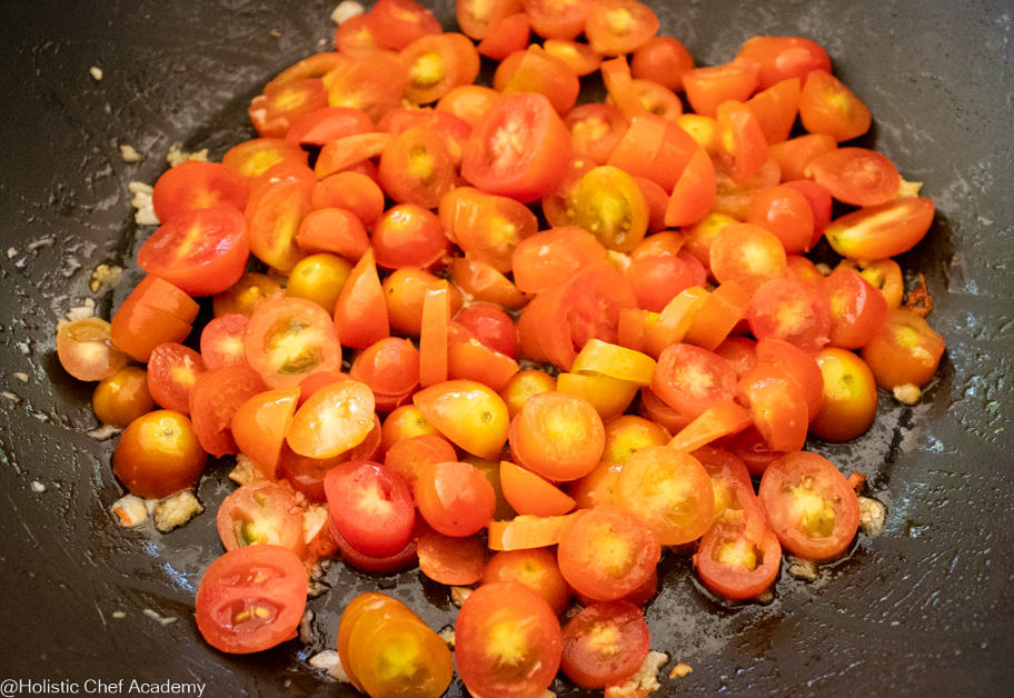 tomatoes cooking for puttanesco