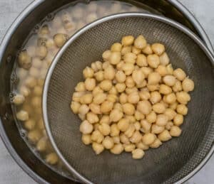 Strain the chickpeas (reserve the cooking liquid)