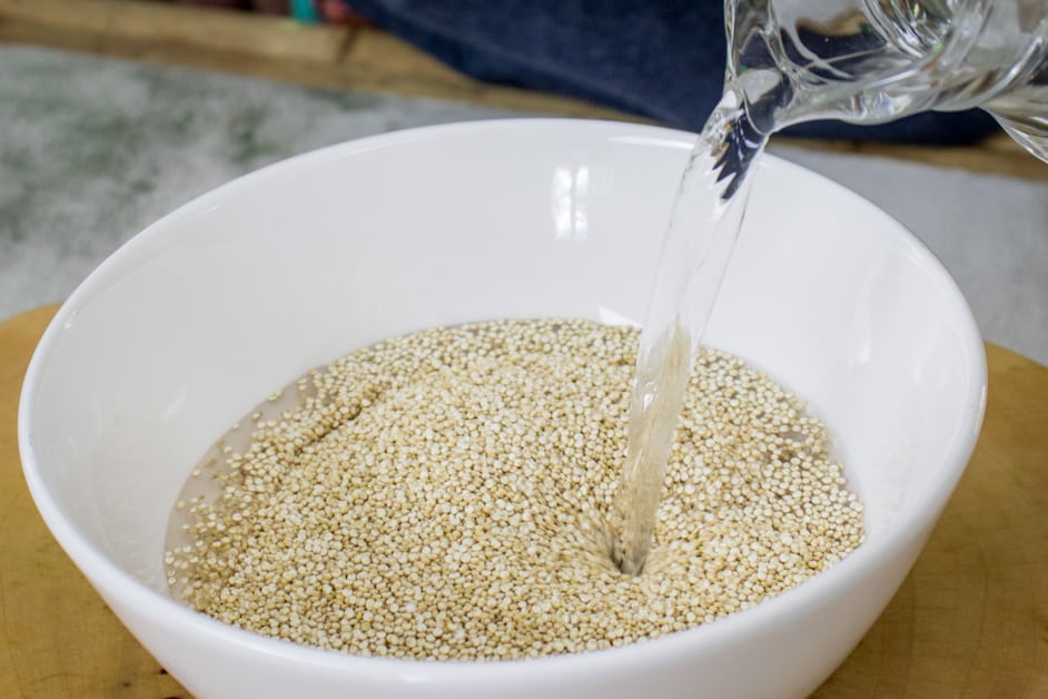 soak the raw quinoa in water before cooking