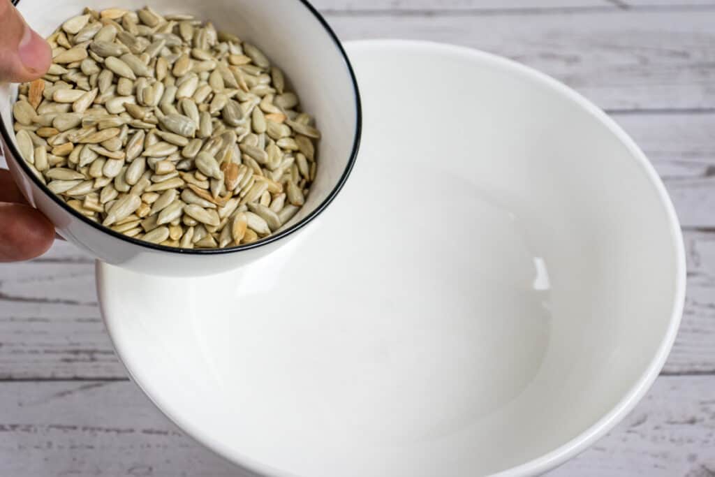 add-sunflower-seeds-to-the-mixing-bowl