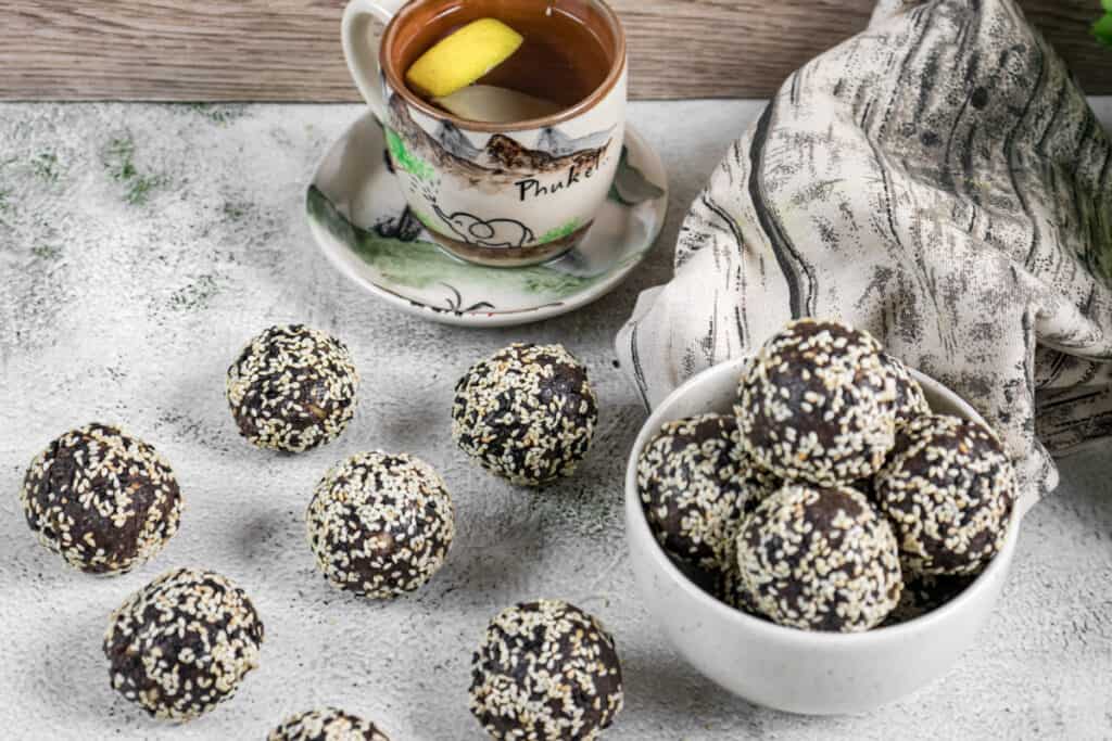 chocolate-sesame-bliss-balls-served-with-a-cup-of-tea