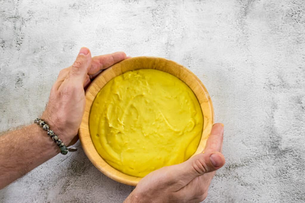 tap-the-bowl-of-tofu-to-remove-any-air-bubbles