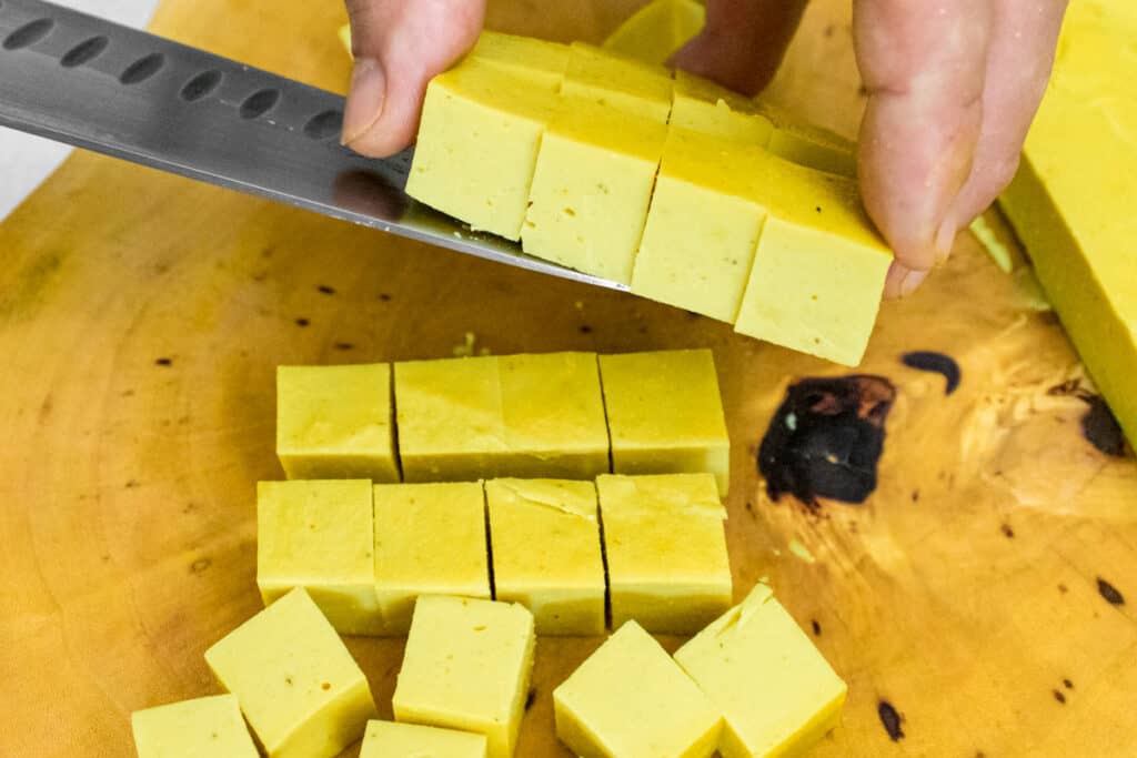 cutting-chickpea-tofu-into-cubes