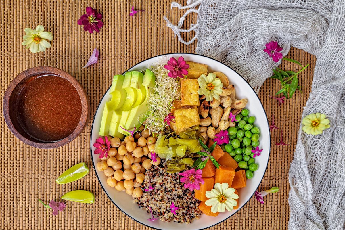 serving-a-happy-buddha-bowl-with-dressing