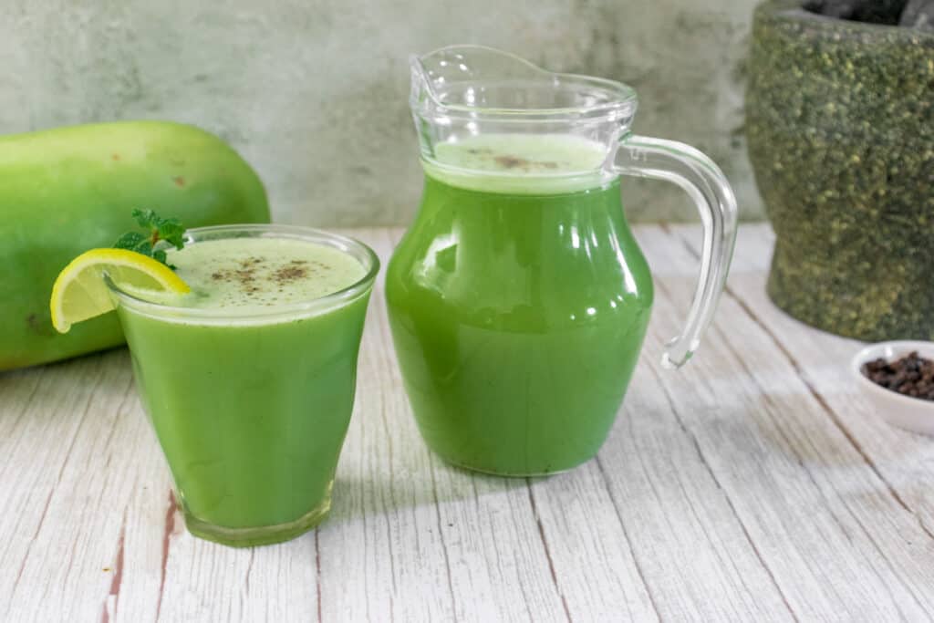ash-gourd-juice-served-with-lemon-and-a-sprig-of-mint