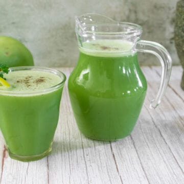 ash-gourd-juice-served-with-lemon-and-a-sprig-of-mint