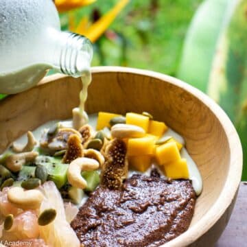 teff porridge with pumpkin seed milk and mango