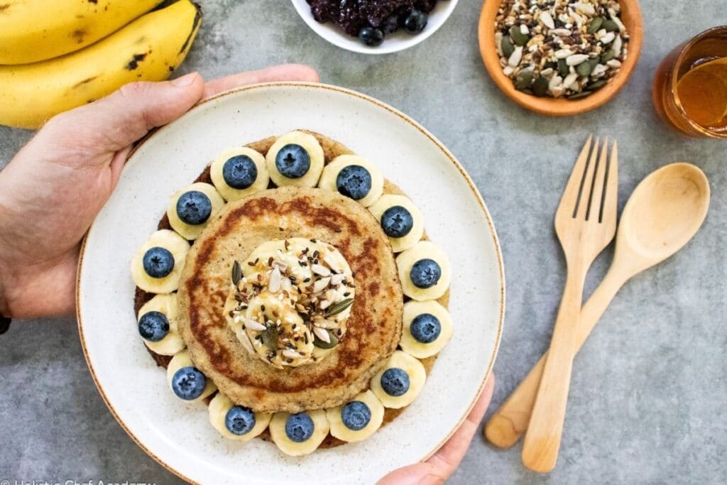 serving-vegan-banana-pancakes-with-blueberries