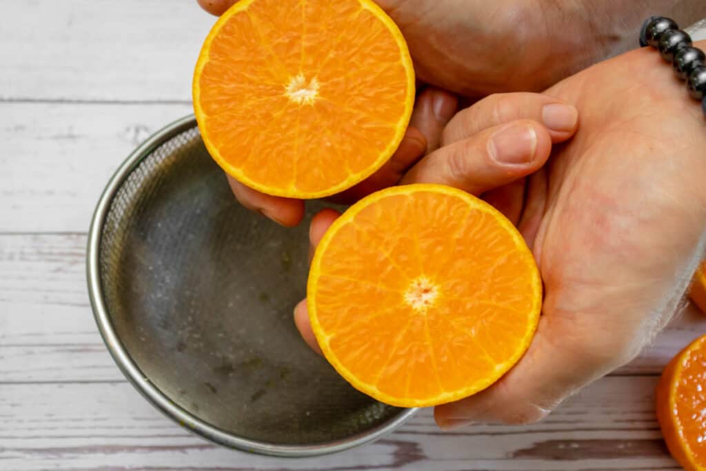 squeezing-fresh-oranges-for-chia-pudding