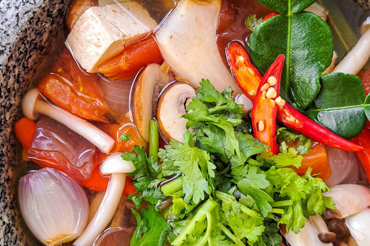 herbal-tom-yum-soup-served-in-a-bowl