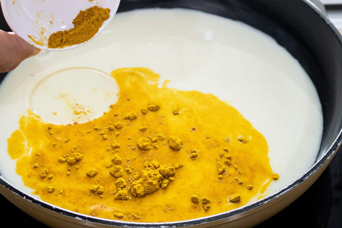 adding-turmeric-powder-to-golden-moon-milk