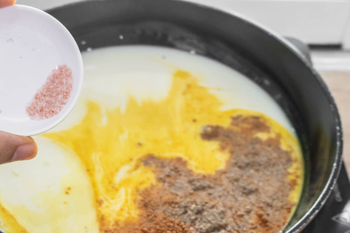 adding-pink-salt-to-the-turmeric-milk