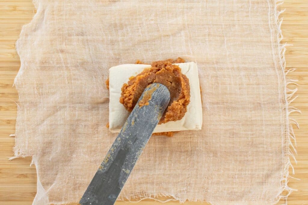 covering-the-tofu-with-miso-marinade
