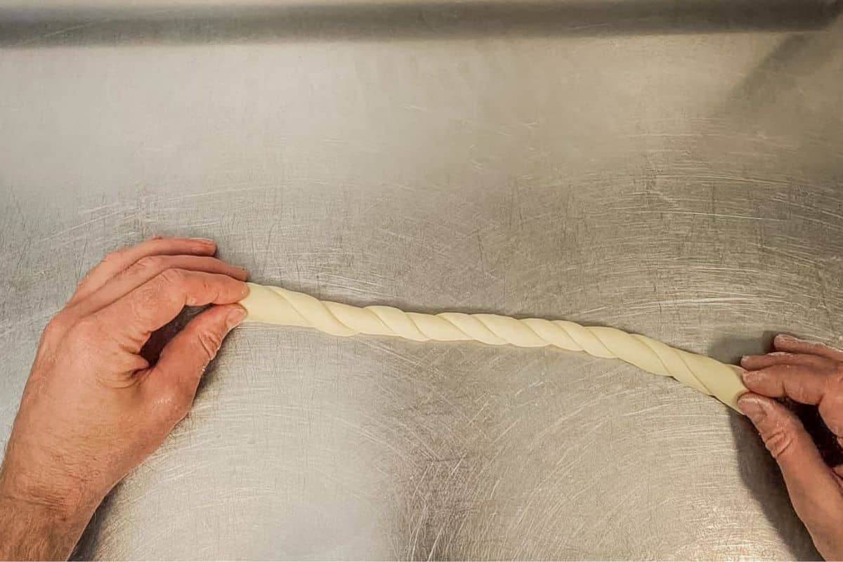 twist the dough in opposite directions to get a spiral shape