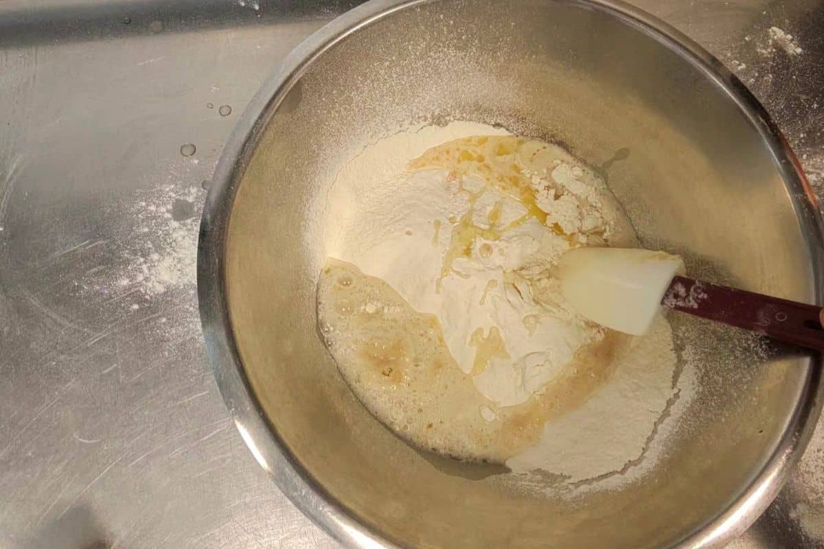 Smooth elastic simit dough in a bowl after kneading and rising