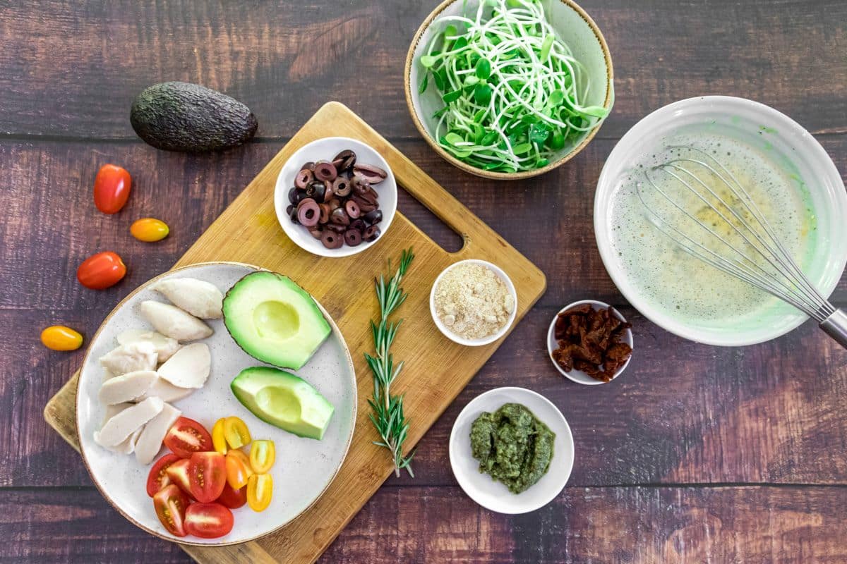 Healthy Mediterranean chickpea flatbread pizza made with a gluten-free socca base and colourful toppings