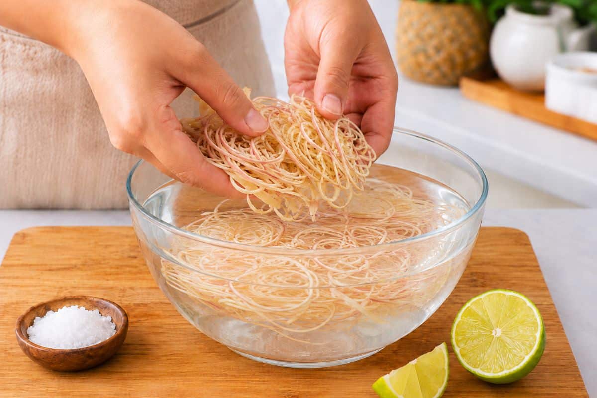 preparing-fresh-banana-flower-soak-in-water-with-lime
