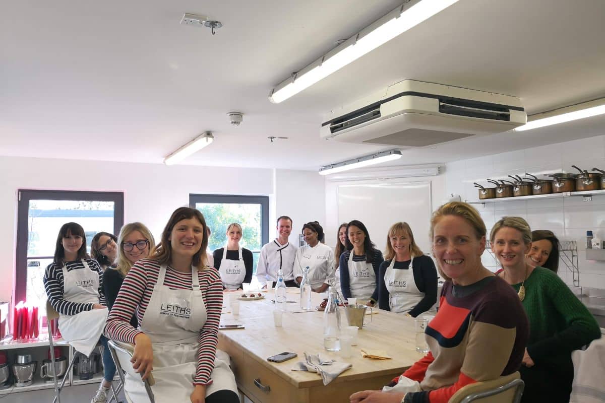 Chef Jamie Raftery teaching raw food and fermentation as part of a practical nutrition cookery class.