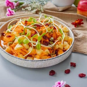 carrot and pineapple salad served in a bowl