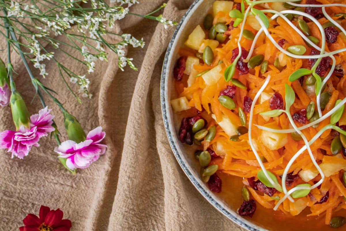 Light and refreshing carrot pineapple salad with cranberries and fresh lime