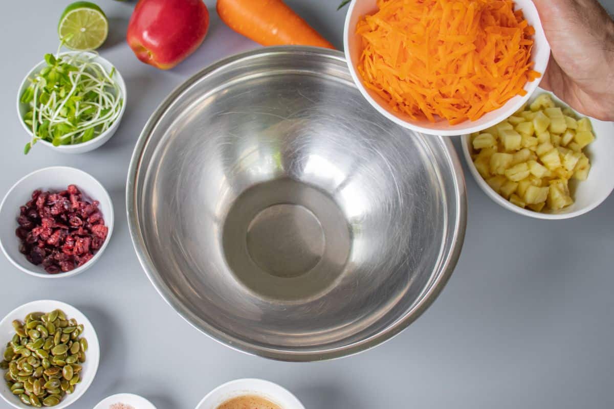 add the grated carrots to a bowl