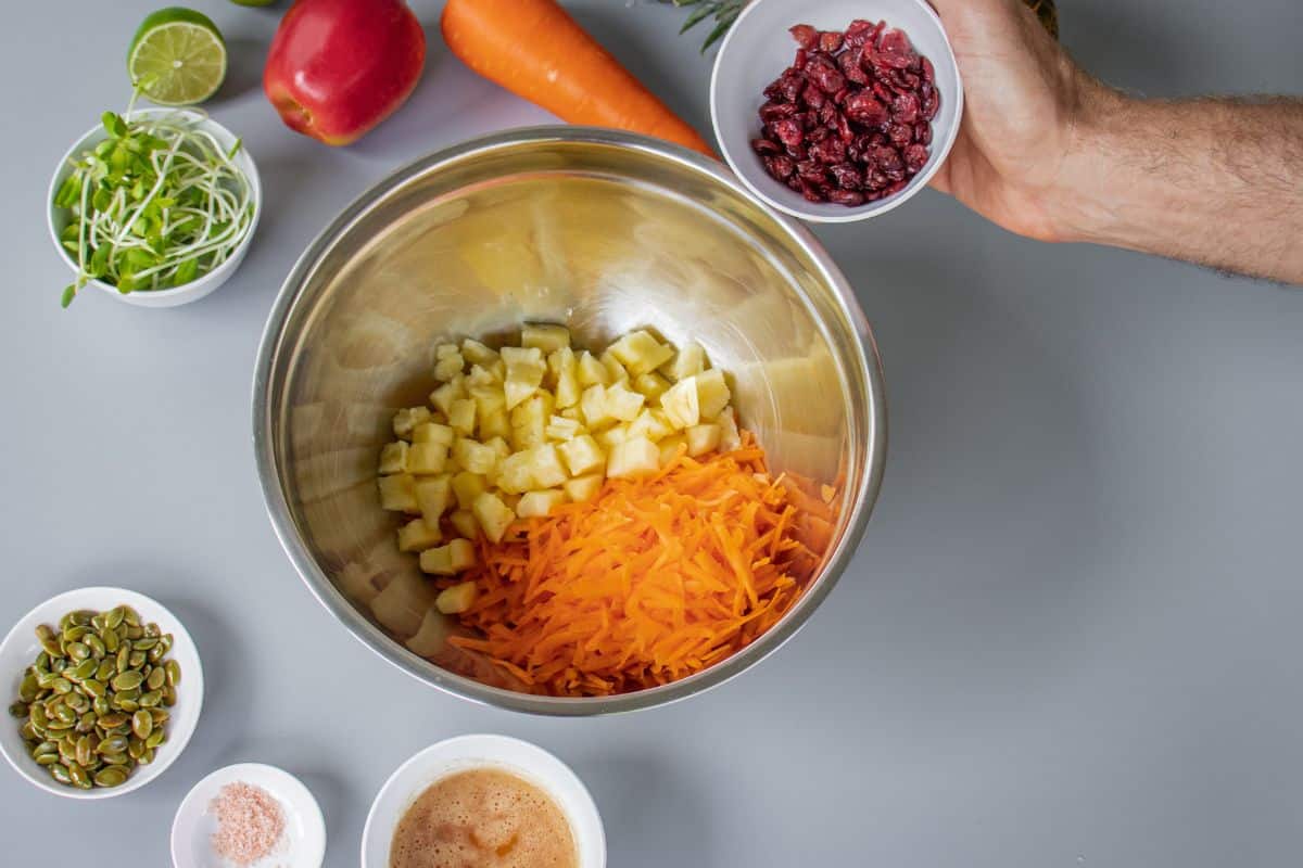 Carrot-Salad-Step-By-Step-6-Add-Dried-Cranberries.