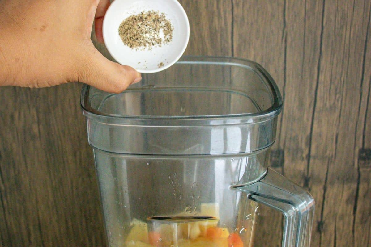 Turmeric-Wellness-Shot-Step-by-Step-10-_-Add-black-pepper-into-a-blender