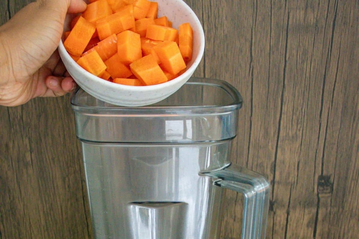 Turmeric-Wellness-Shot-Step-by-Step-2-_-Add-carrot-into-a-blender