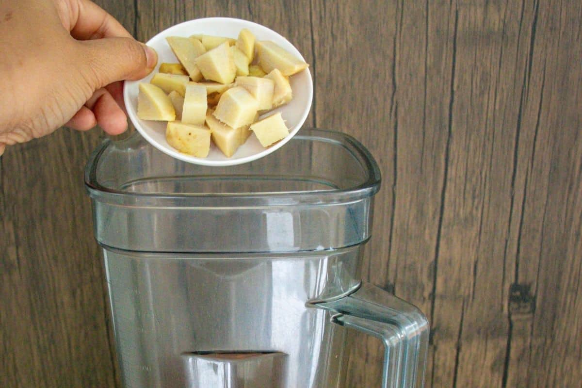 Turmeric-Wellness-Shot-Step-by-Step-3-_-Add-ginger-into-a-blender