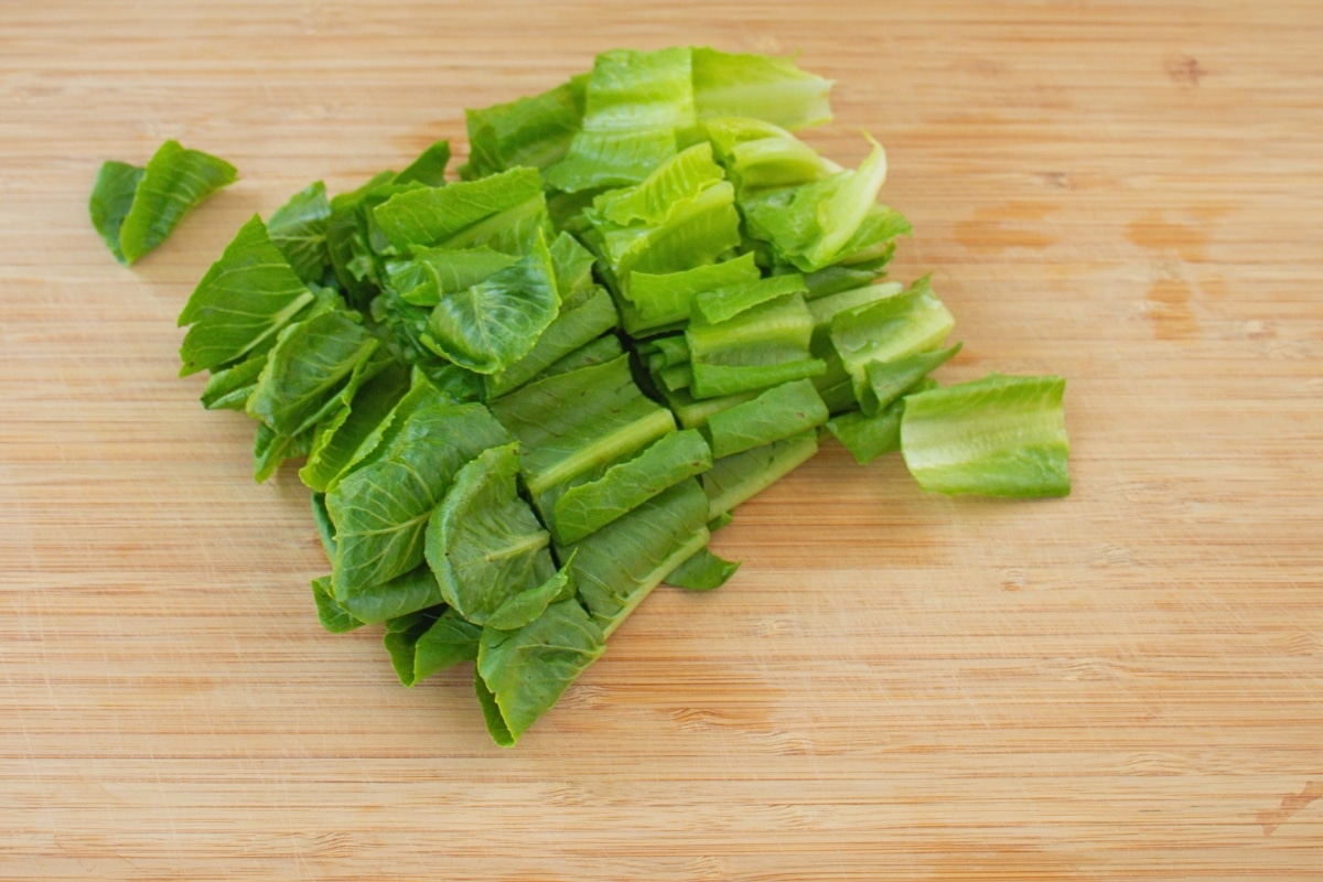 Cos lettuce cut into bite-sized pieces for Burmese Tea Leaf Salad