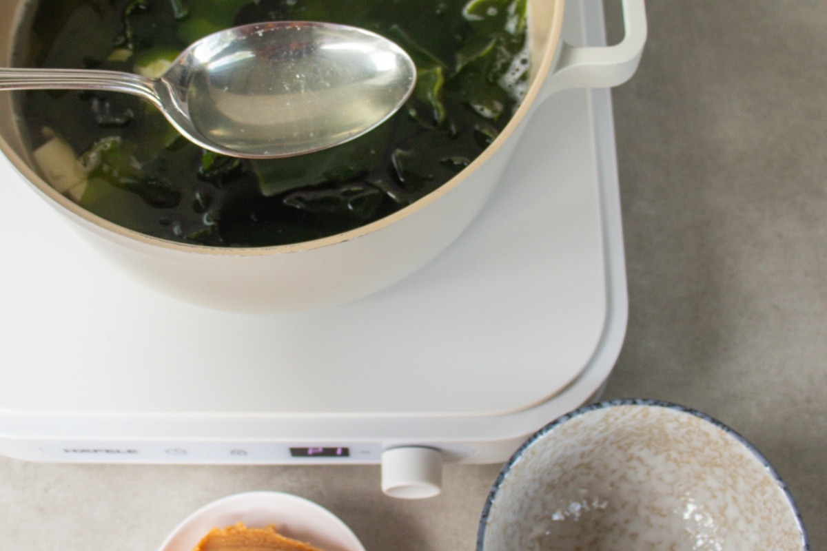 Add some of the liquid to a small bowl