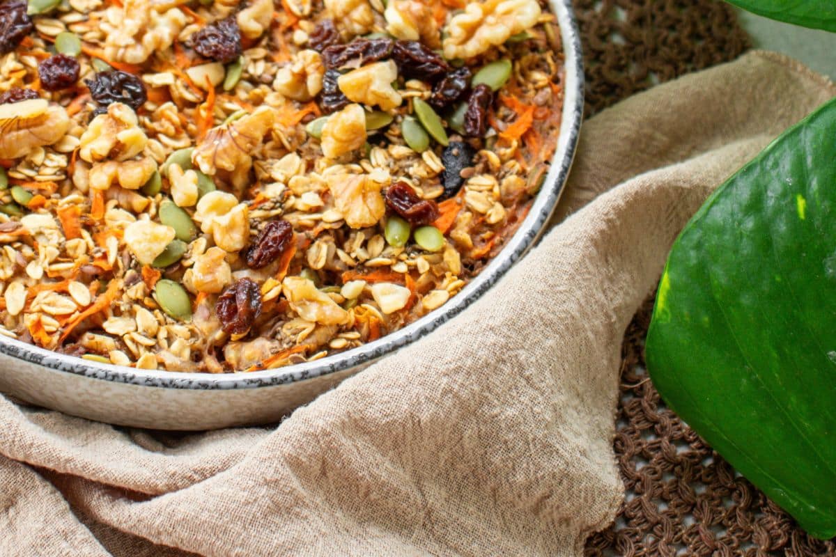Homemade carrot cake baked oatmeal with walnuts, raisins and pumpkin seeds